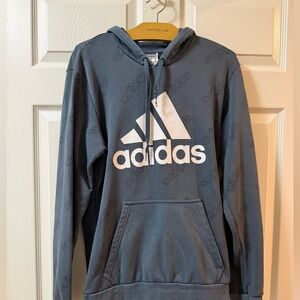 Vintage Adidas Hoodie With Large Logo And Repeating Pattern. Mens Medium